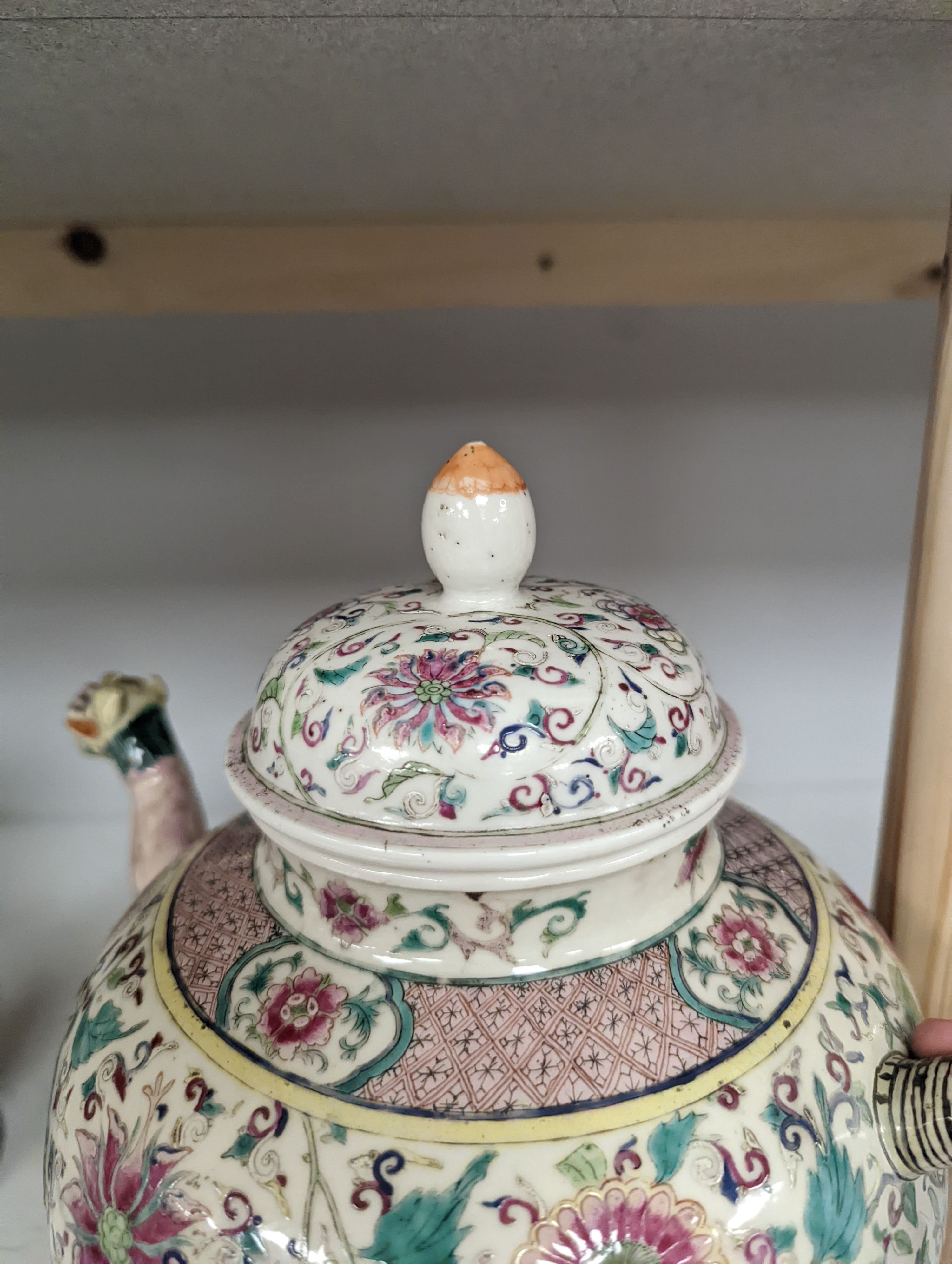 A large 19th century Chinese famille rose wine pot, and another wine pot, tallest 27cm